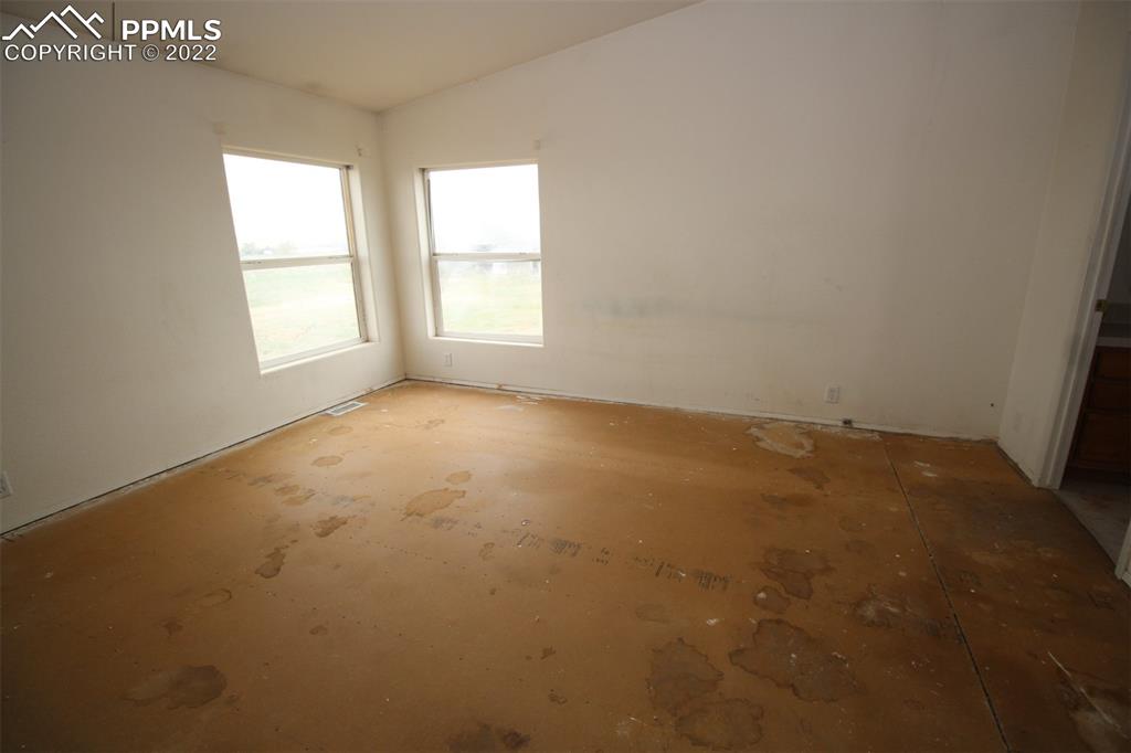 6550 Sengbeil Road Calhan, CO 80808 - Photo 11 of 21 an empty room with a window