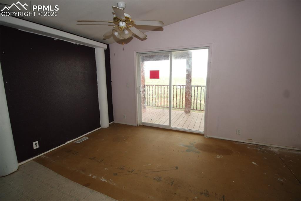 6550 Sengbeil Road Calhan, CO 80808 - Photo 8 of 21 a view of an empty room with a window