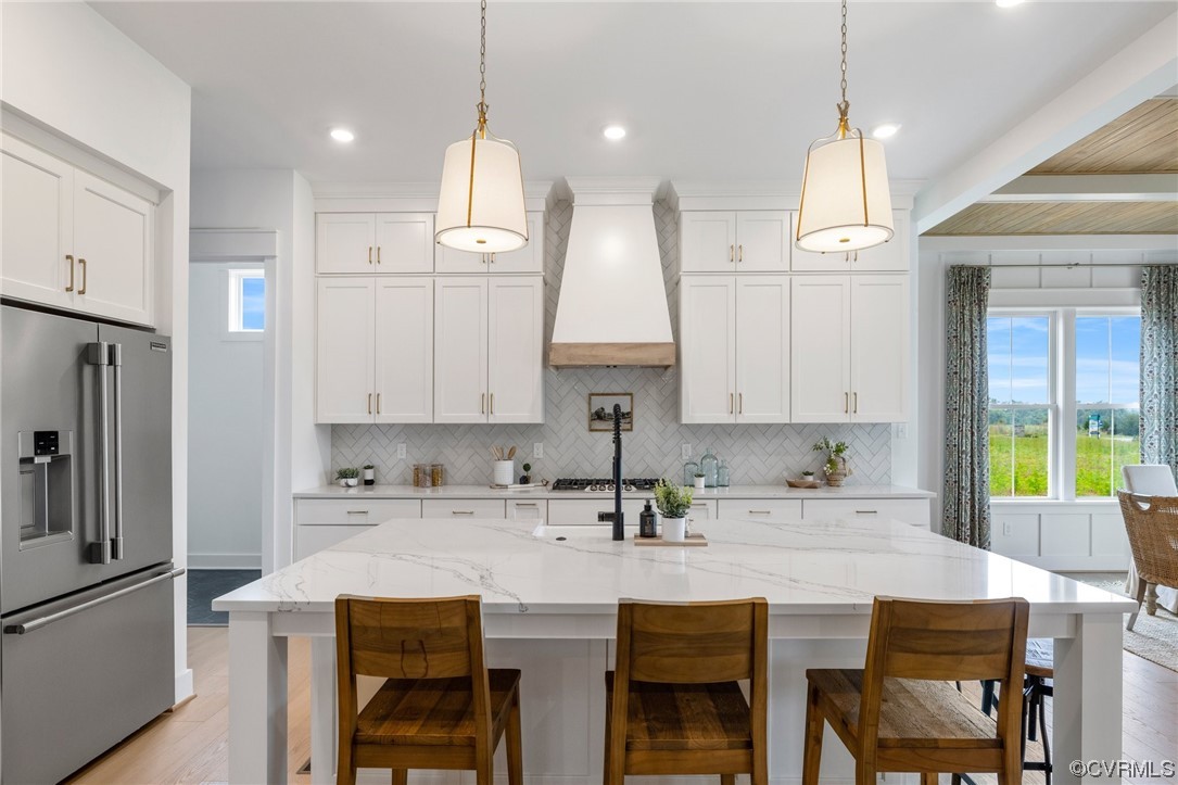15124 Heaton Drive Midlothian, VA 23112 - Photo 13 of 49 a kitchen with a sink a counter space appliances and cabinets