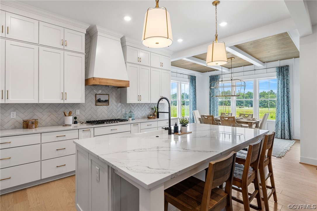 15124 Heaton Drive Midlothian, VA 23112 - Photo 14 of 49 a kitchen with stainless steel appliances granite countertop a sink a stove and a wooden cabinets