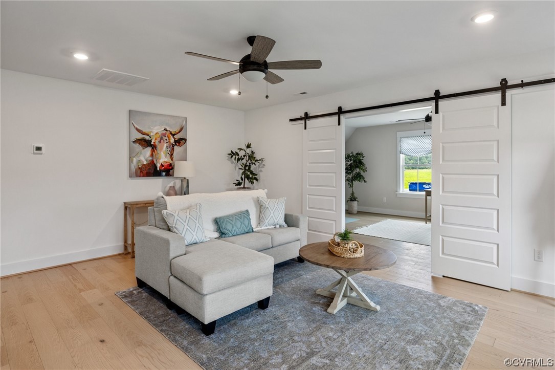 15124 Heaton Drive Midlothian, VA 23112 - Photo 23 of 49 a living room with furniture and a ceiling fan