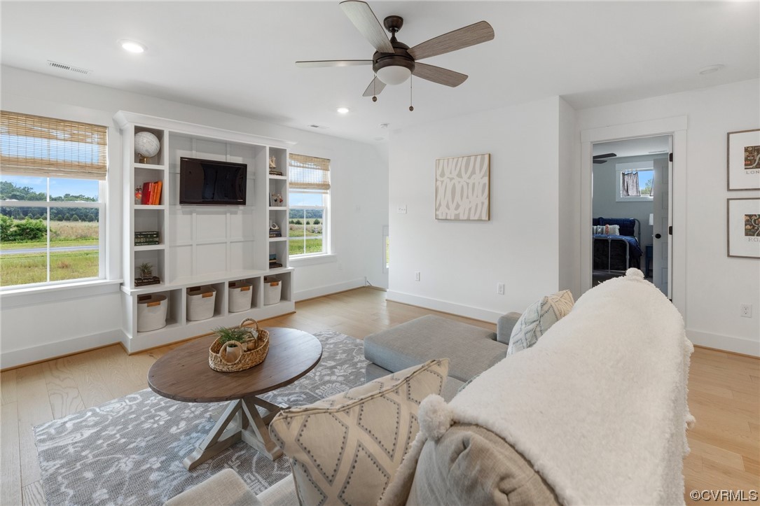 15124 Heaton Drive Midlothian, VA 23112 - Photo 25 of 49 a living room with furniture and flat screen tv