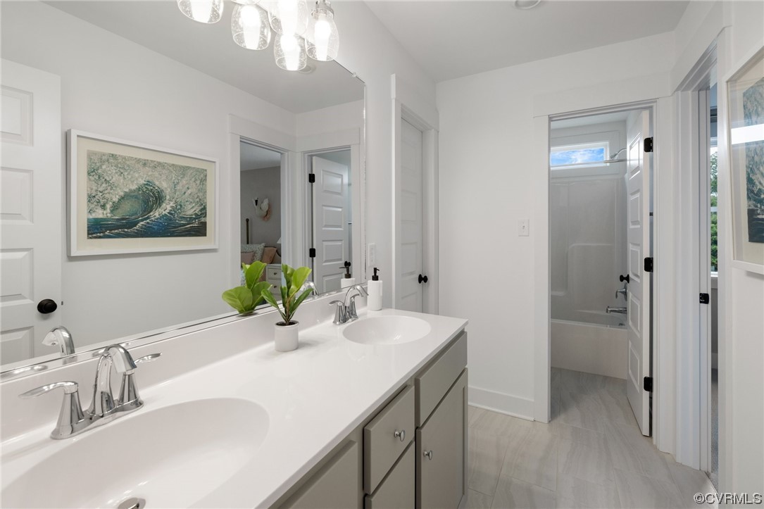 15124 Heaton Drive Midlothian, VA 23112 - Photo 30 of 49 a bathroom with a sink and a mirror