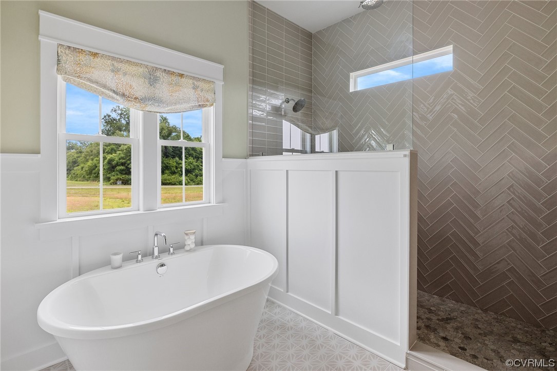 15124 Heaton Drive Midlothian, VA 23112 - Photo 40 of 49 a bathroom with a bathtub and a sink