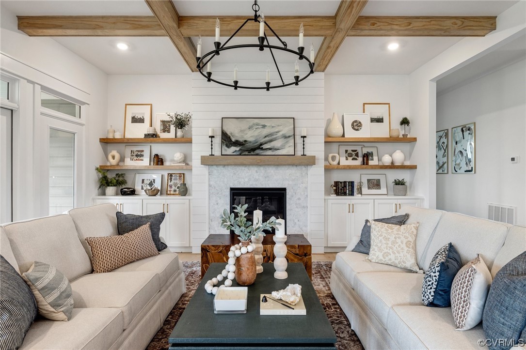 15124 Heaton Drive Midlothian, VA 23112 - Photo 8 of 49 a living room with furniture and a fireplace