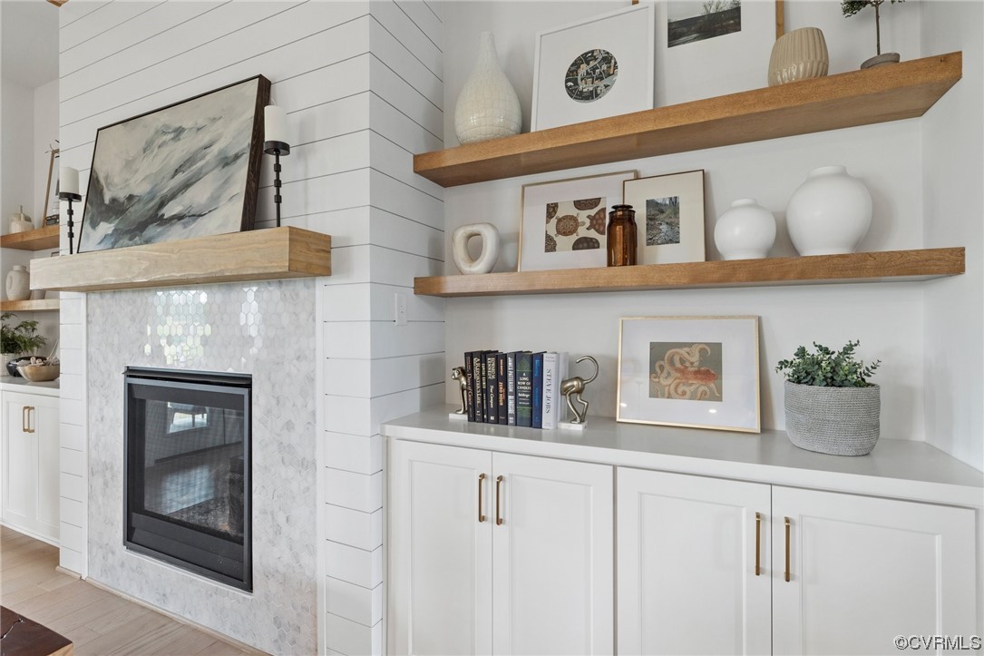15124 Heaton Drive Midlothian, VA 23112 - Photo 9 of 49 a kitchen with cabinets and a wooden floor