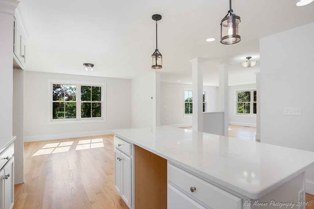 116 Bennett Hill Road Rowley, MA 01969 - Photo 15 of 39 a view of a kitchen with a sink stainless steel appliances and cabinets