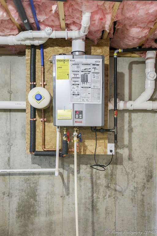 116 Bennett Hill Road Rowley, MA 01969 - Photo 32 of 39 a view of a room with a table and chairs