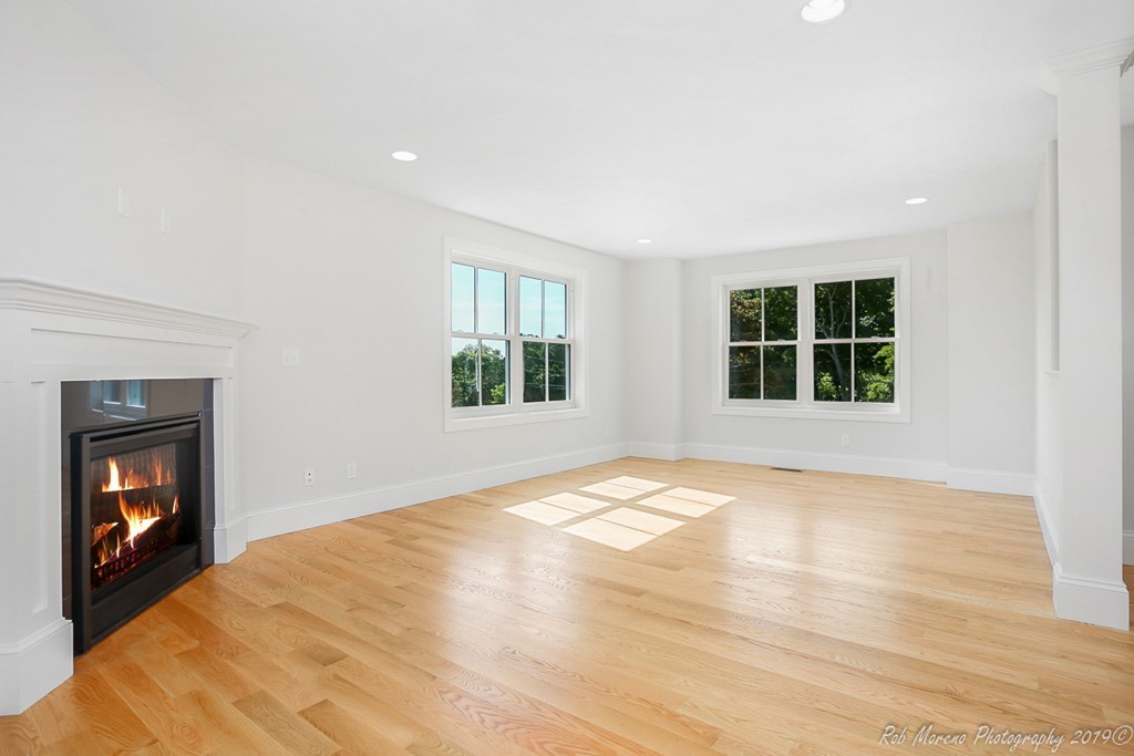 116 Bennett Hill Road Rowley, MA 01969 - Photo 7 of 39 a view of empty room with wooden floor and fan