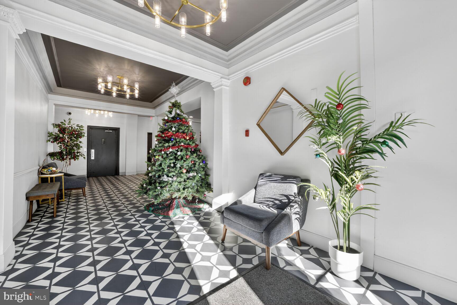 1669 Columbia Road Northwest, Unit 313 Washington, DC 20009 - Photo 3 of 20 a living room with furniture