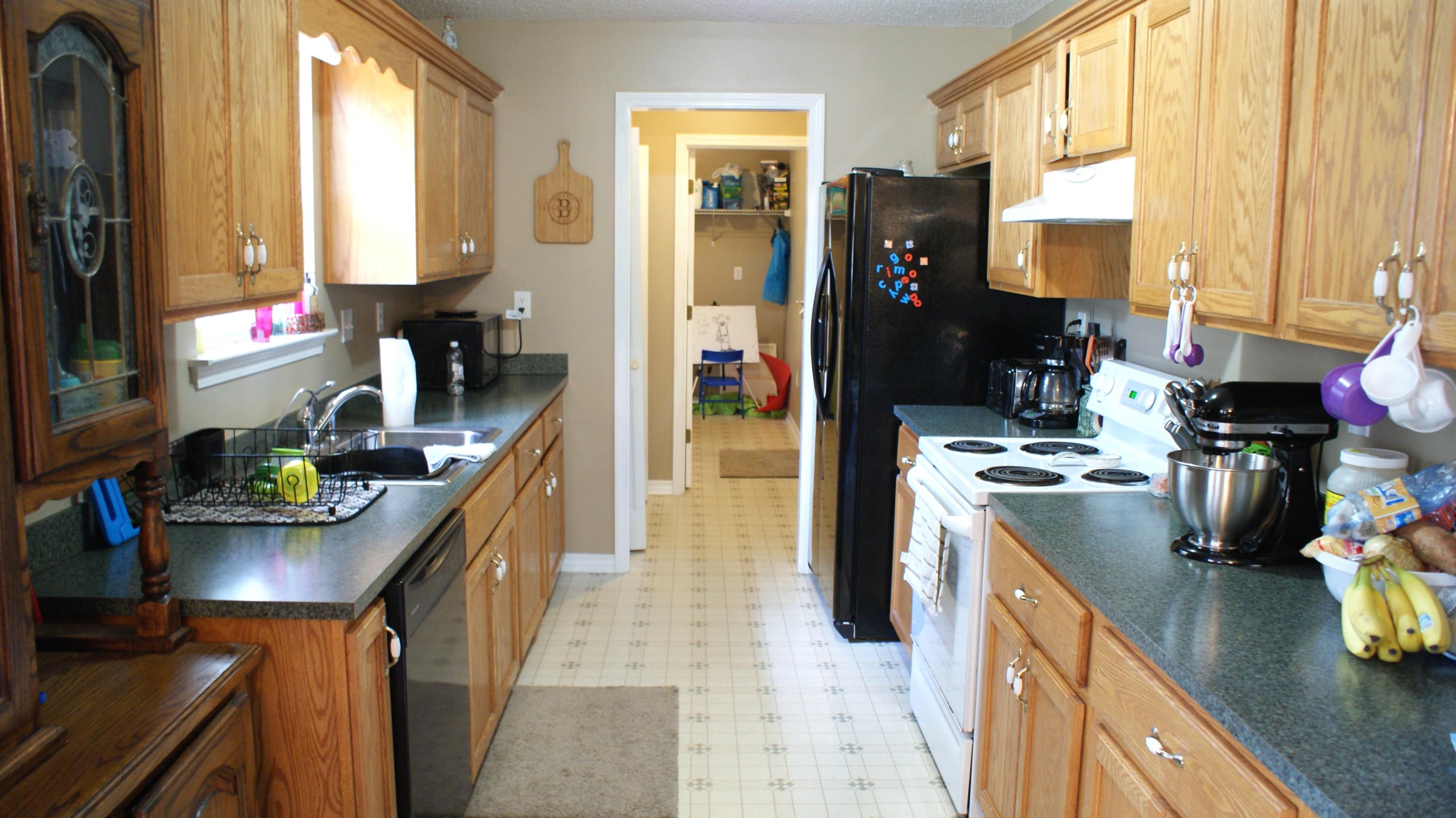 897 Lighthouse Church Road Holt, FL 32564 - Photo 11 of 15 a kitchen with lots of counter top space and furniture