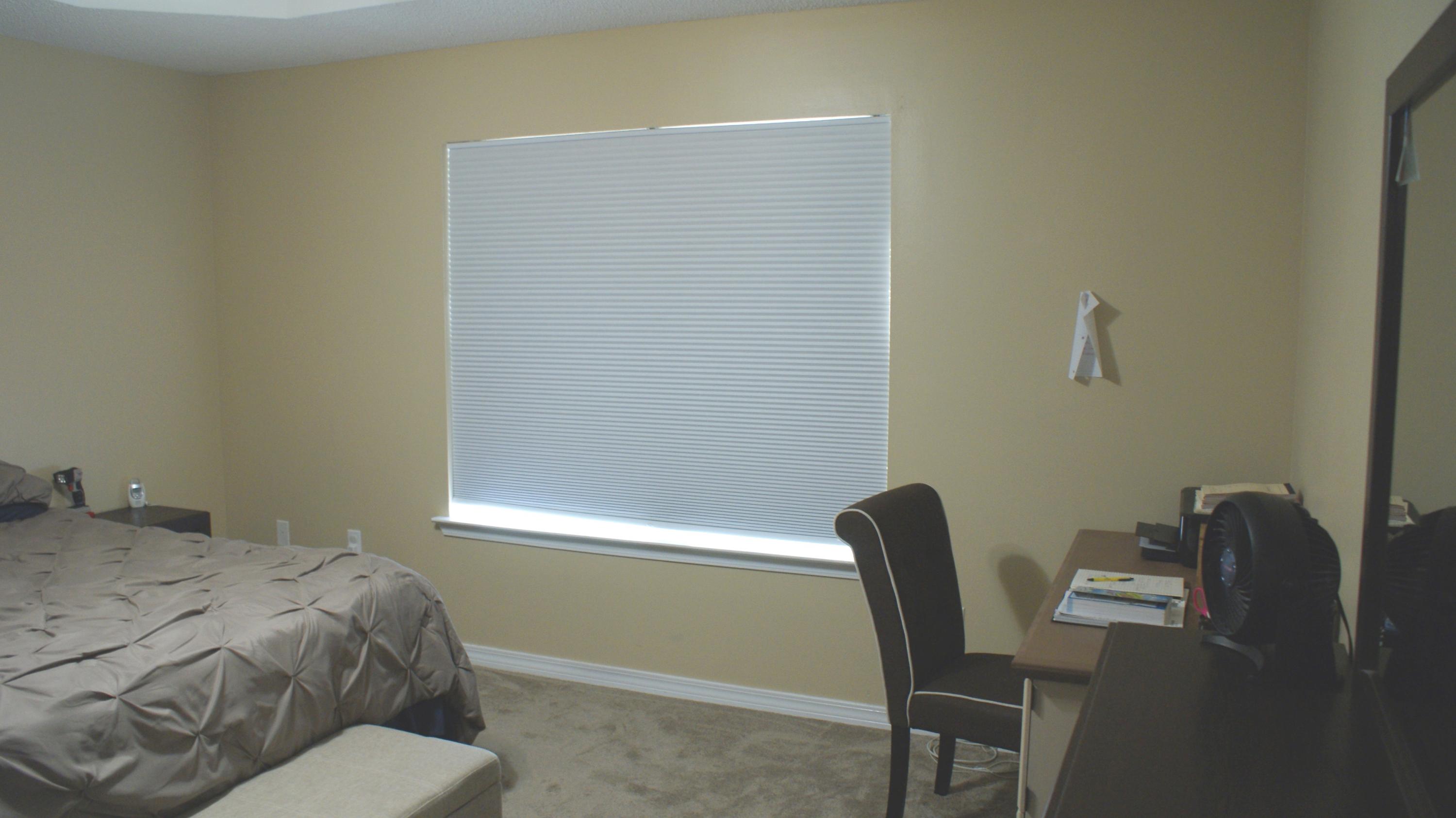 897 Lighthouse Church Road Holt, FL 32564 - Photo 3 of 15 a bedroom with a bed and chair