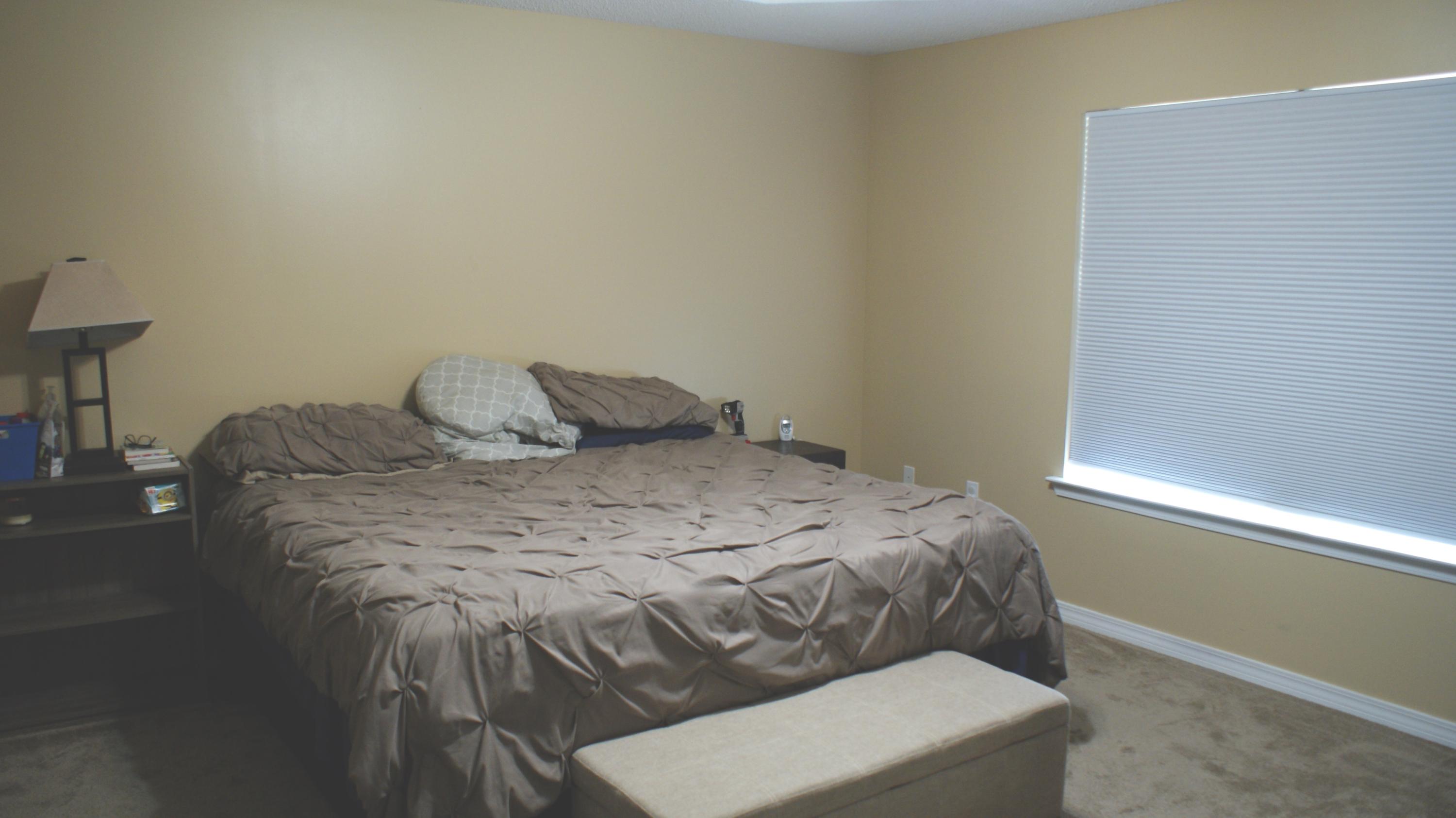 897 Lighthouse Church Road Holt, FL 32564 - Photo 8 of 15 a bedroom with a bed and a window
