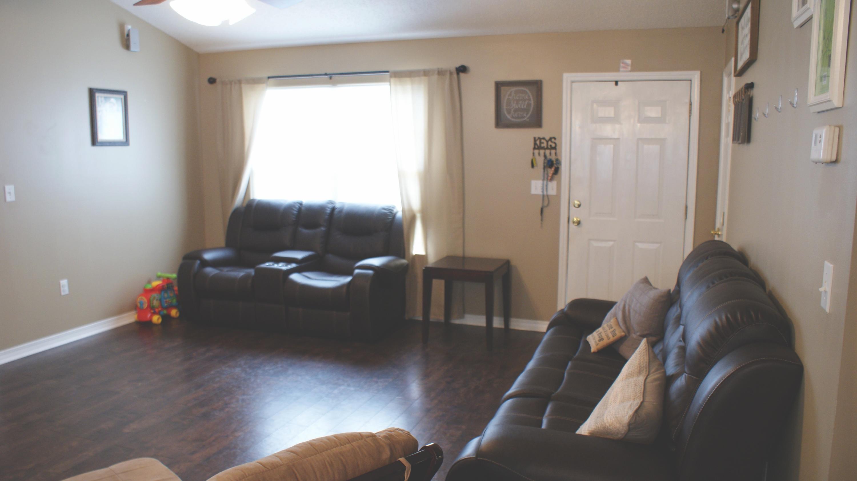 897 Lighthouse Church Road Holt, FL 32564 - Photo 9 of 15 a living room with furniture and a window