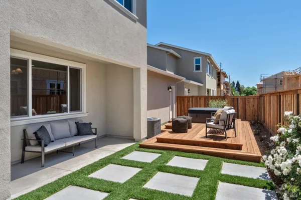 a view of a two chair in the patio