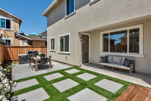 a view of a house with a patio
