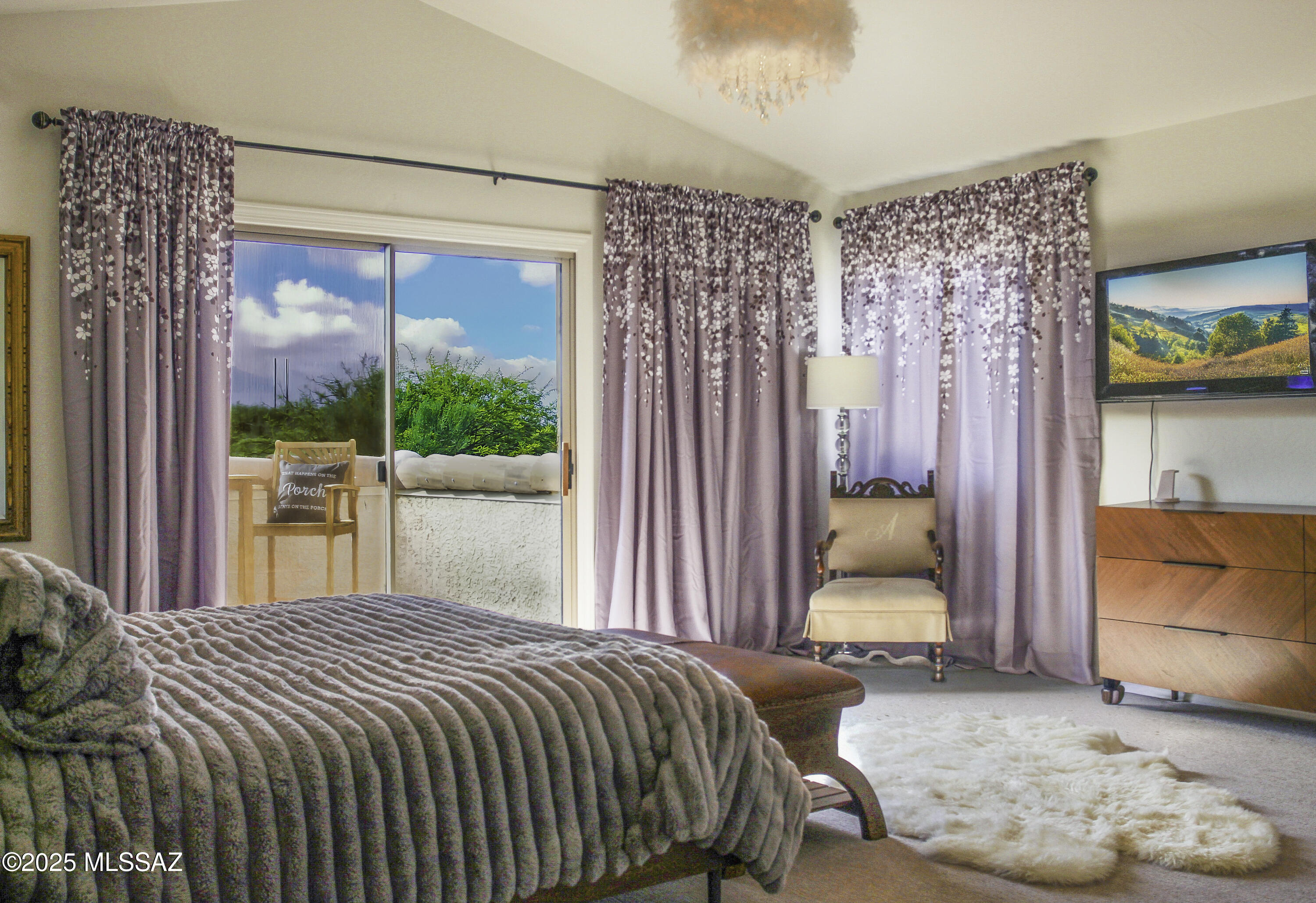 5202 Spring View Drive Tucson, AZ 85749 - Photo 27 of 49 a bedroom with a bed and glass window