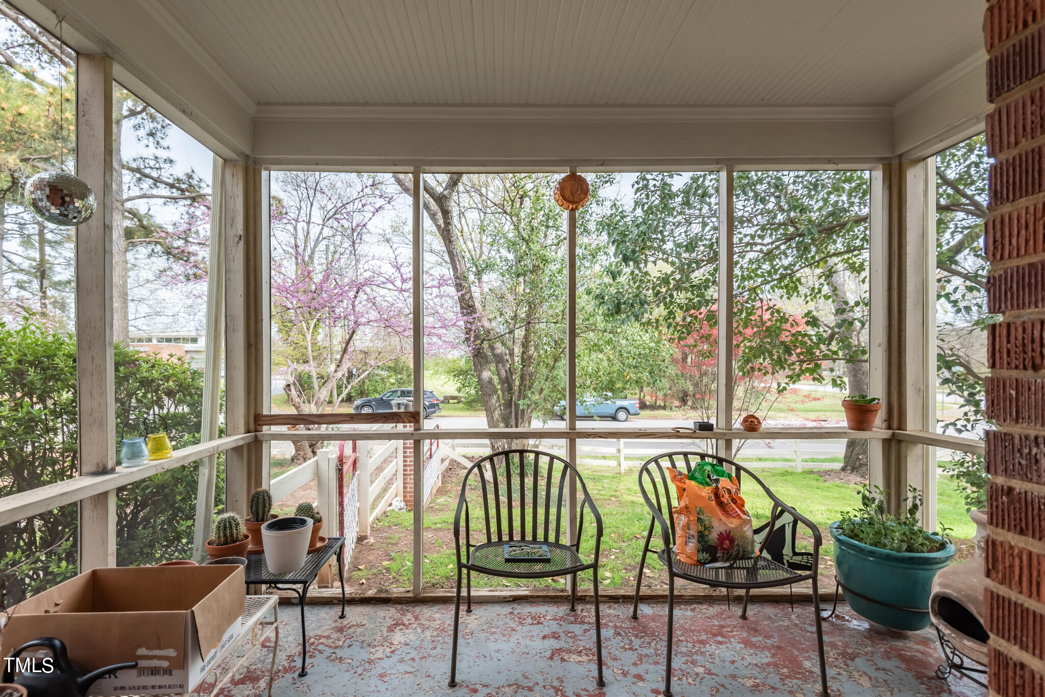 2410 Garner Road Raleigh, NC 27610 - Photo 27 of 32 a balcony with chairs and table in the balcony