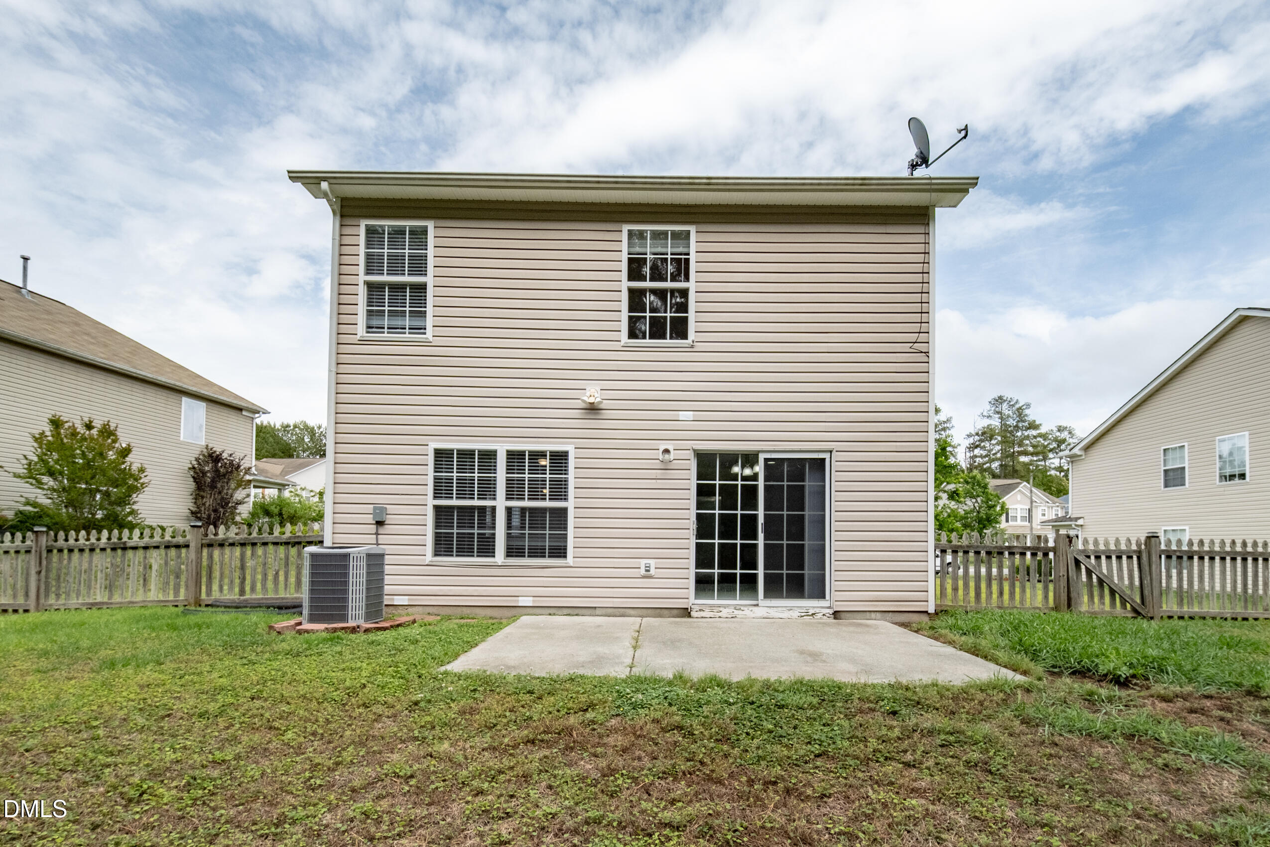 719 Obsidian Way Durham, NC 27703 - Photo 17 of 41 a front view of a house with a yard