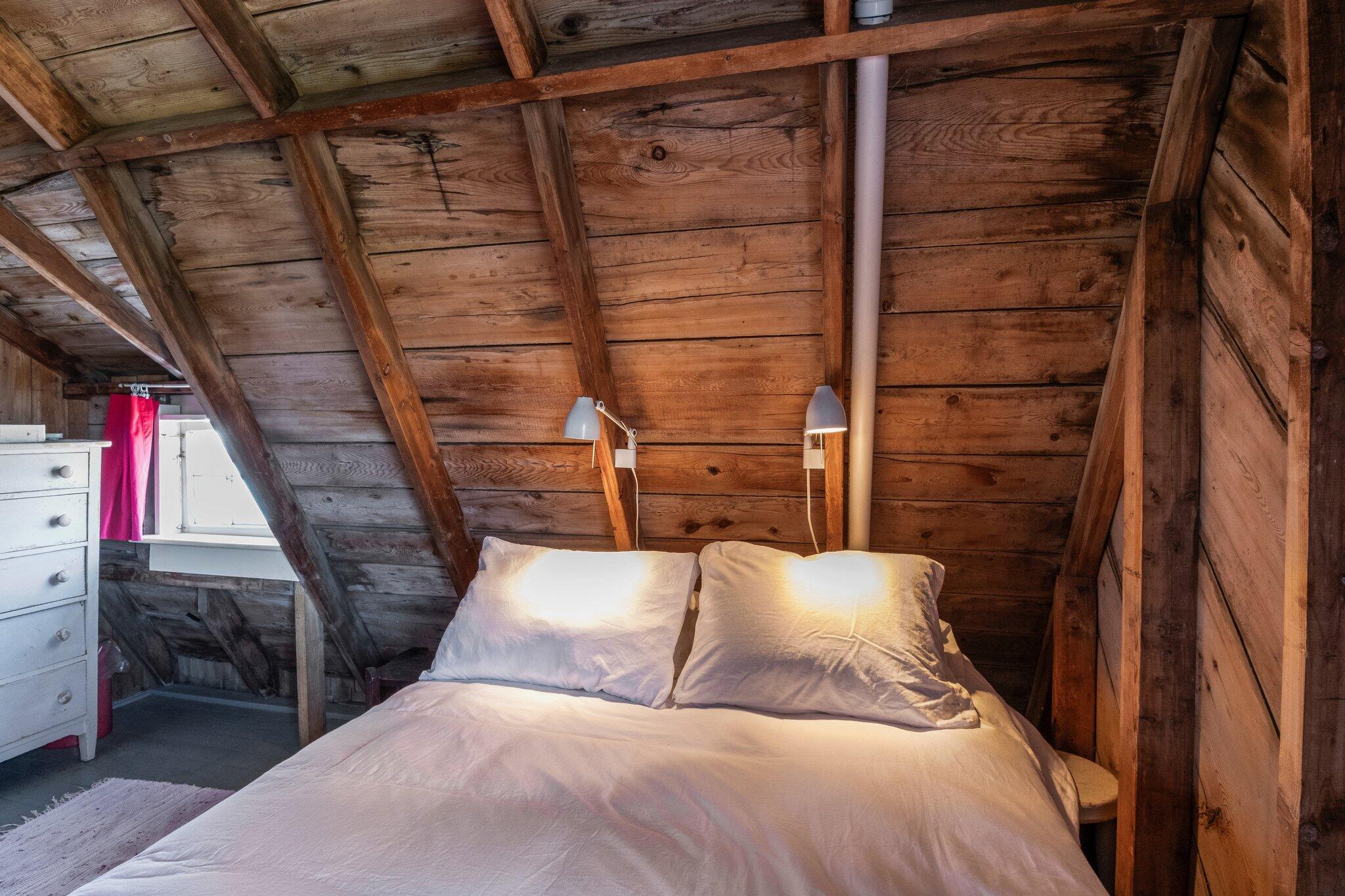 8 Pilgrims Path Truro, MA 02666 - Photo 28 of 49 a bed room with a bed and a walk in closet