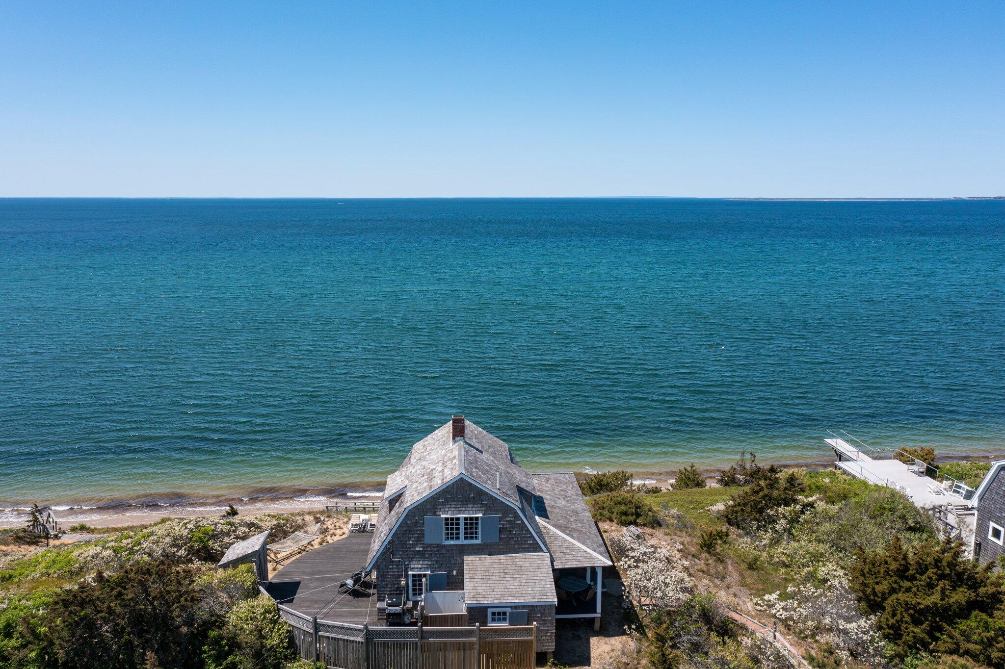 8 Pilgrims Path Truro, MA 02666 - Photo 43 of 49 a view of a lake with a outdoor space
