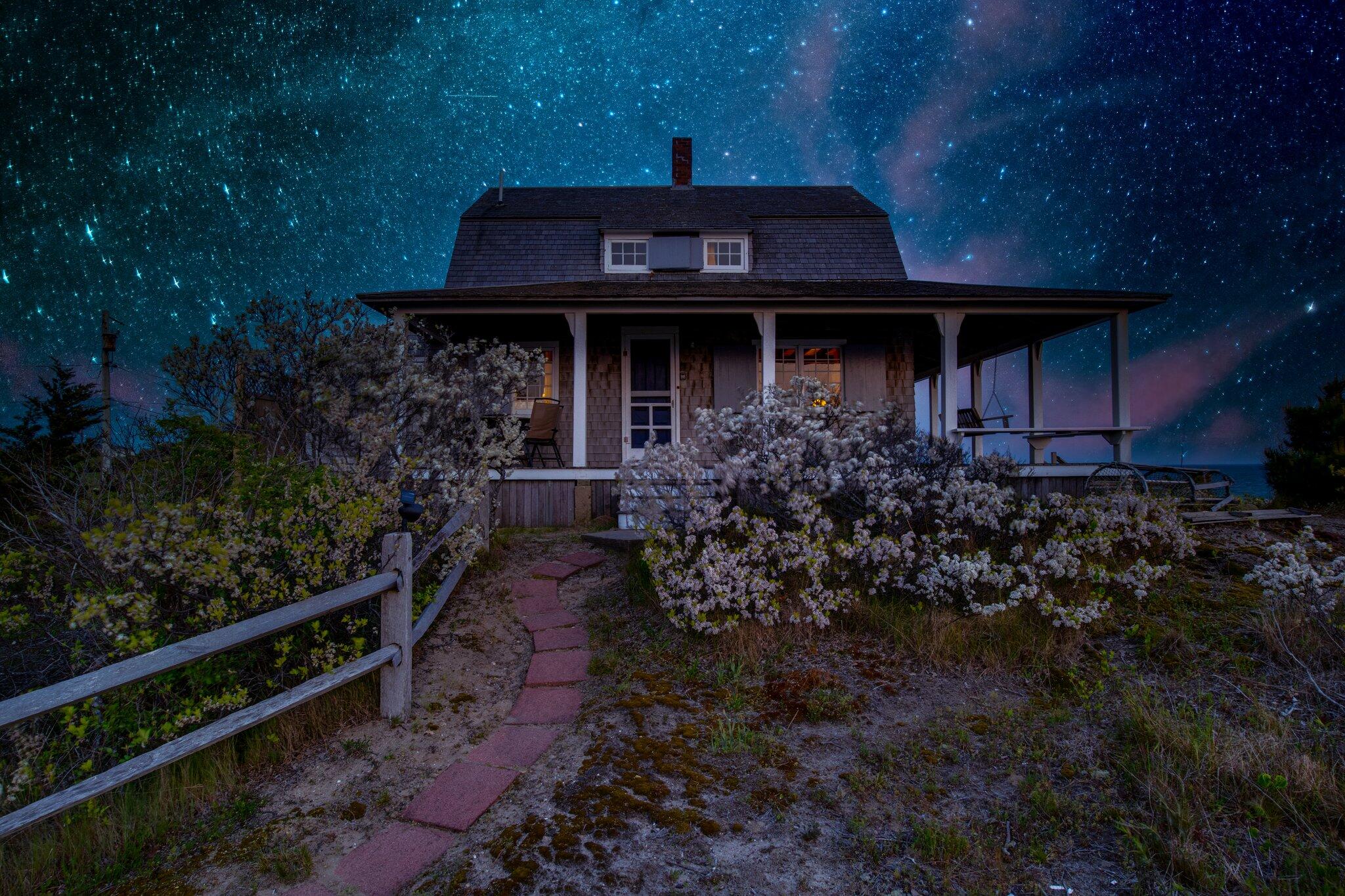 8 Pilgrims Path Truro, MA 02666 - Photo 49 of 49 a front view of a house with a yard