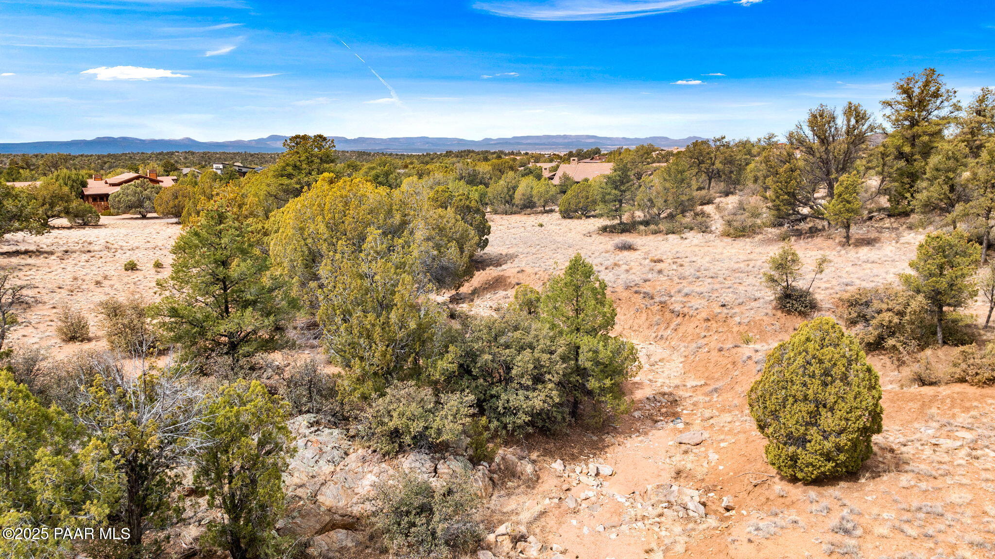 5495 West Three Forks Road Prescott, AZ 86305 - Photo 19 of 30 a view of a yard with a lake