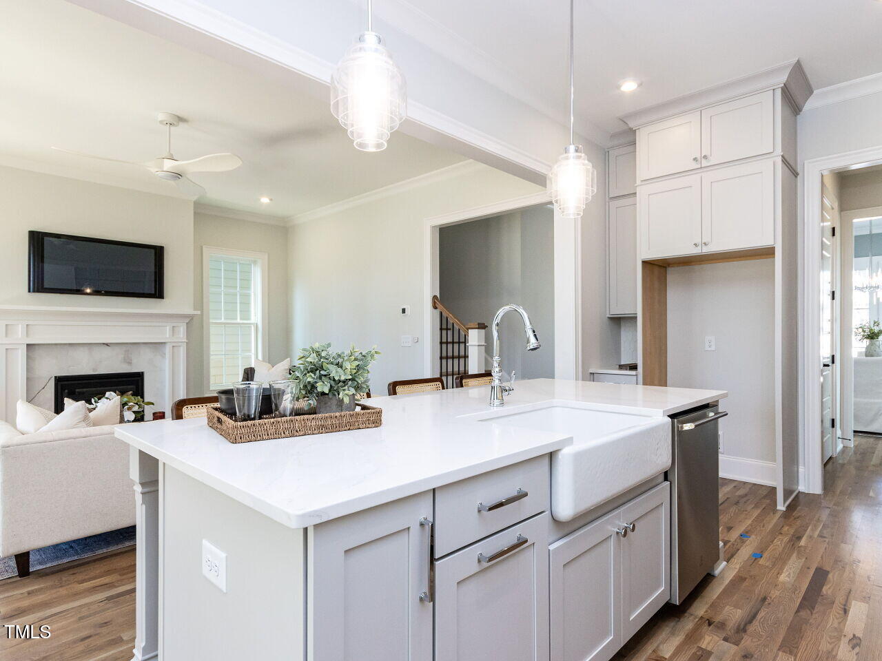 809 St Charles Street Durham, NC 27713 - Photo 16 of 43 a kitchen with a sink and a stove top oven with wooden floor