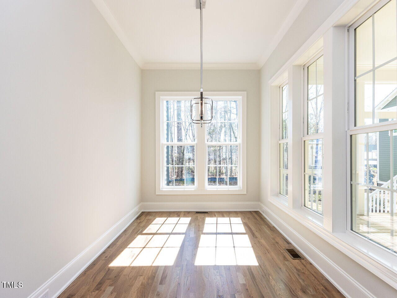 809 St Charles Street Durham, NC 27713 - Photo 17 of 43 a view of an empty room with a window