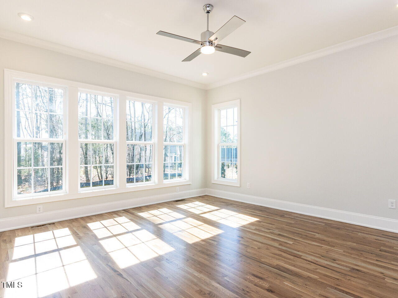 809 St Charles Street Durham, NC 27713 - Photo 19 of 43 a view of an empty room with a window and wooden floor