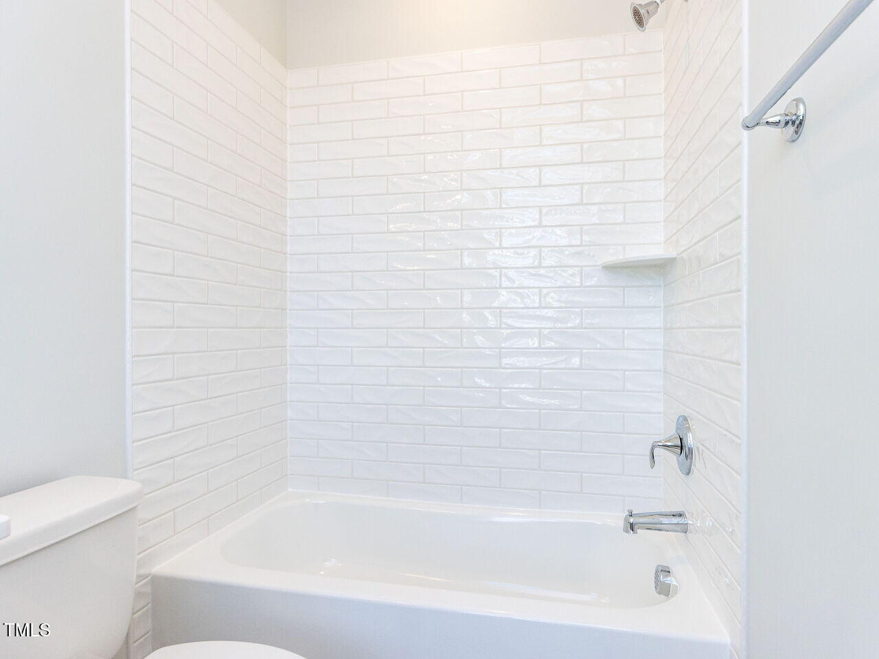 809 St Charles Street Durham, NC 27713 - Photo 30 of 43 a bathroom with a bathtub