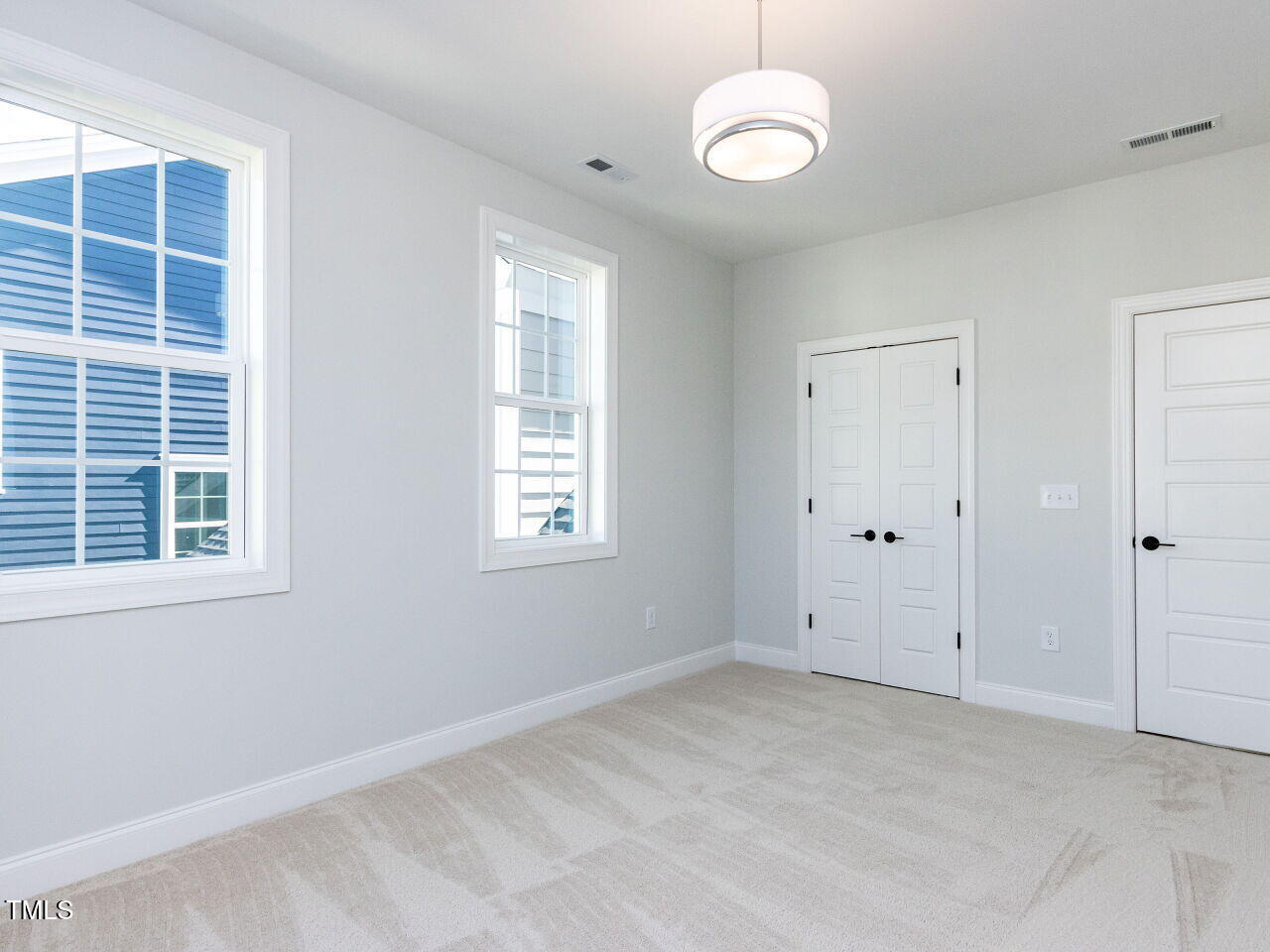 809 St Charles Street Durham, NC 27713 - Photo 33 of 43 a view of an empty room with a window