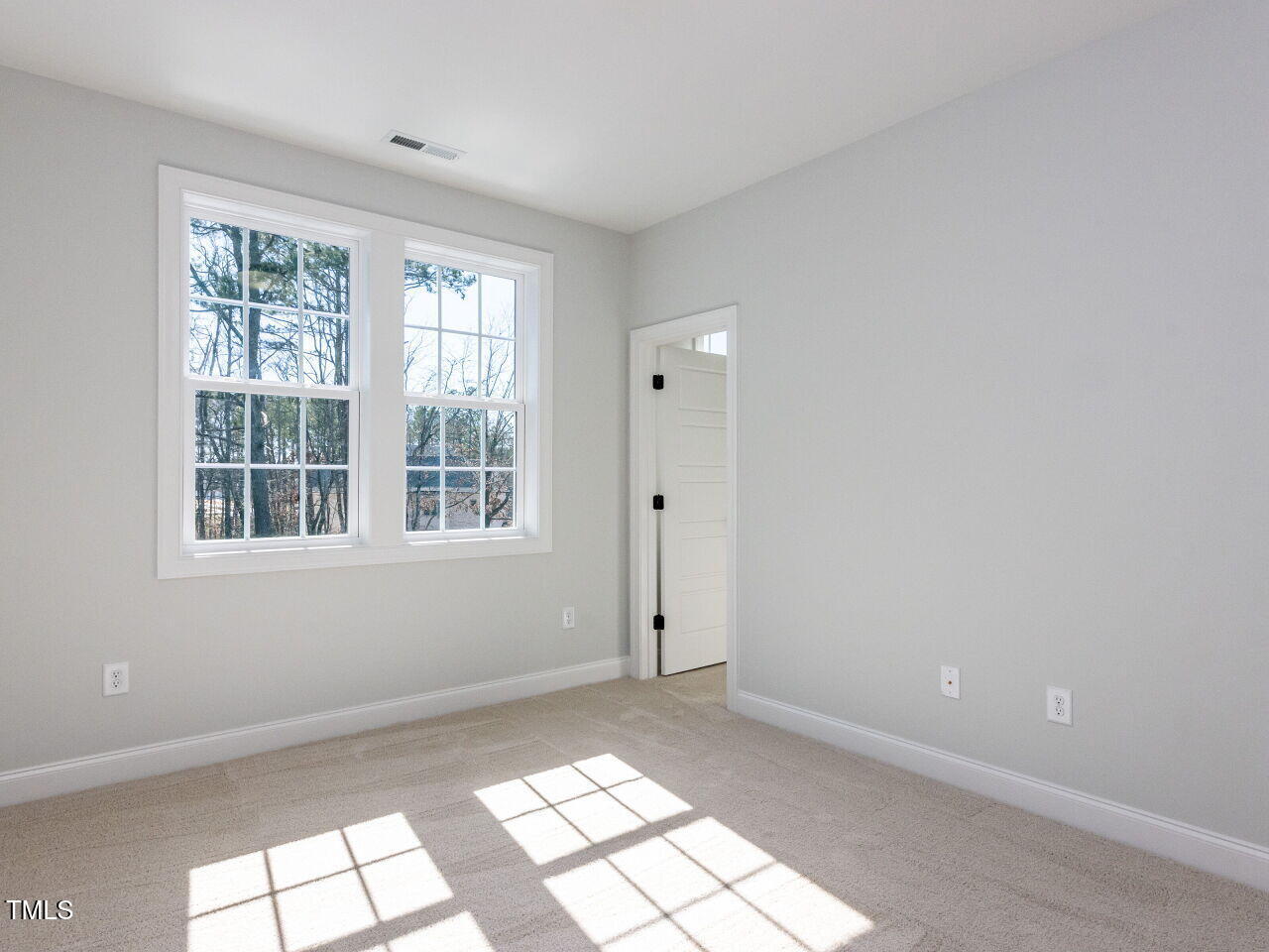 809 St Charles Street Durham, NC 27713 - Photo 36 of 43 an empty room with windows