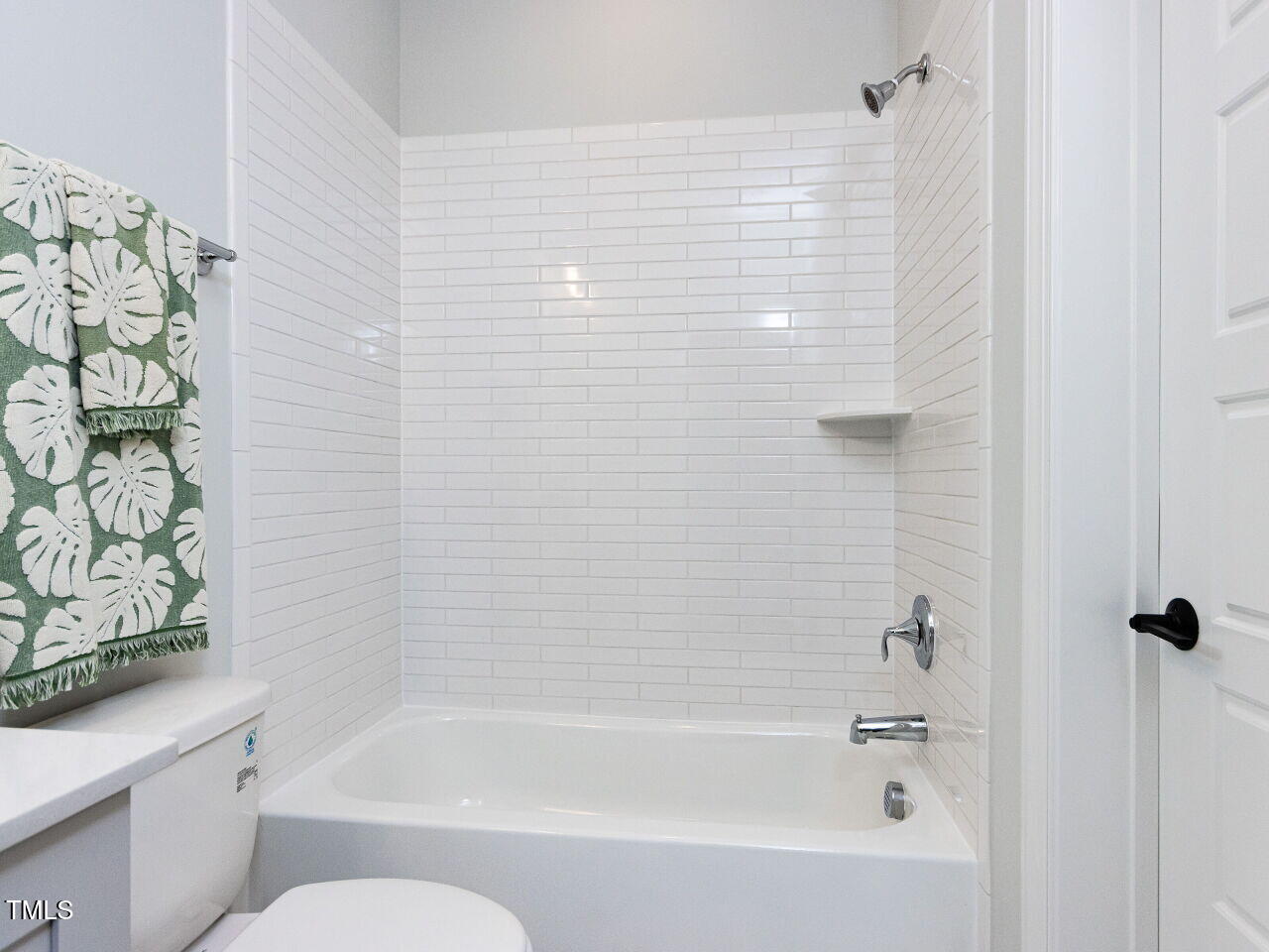 809 St Charles Street Durham, NC 27713 - Photo 39 of 43 a bathroom with a bathtub and shower