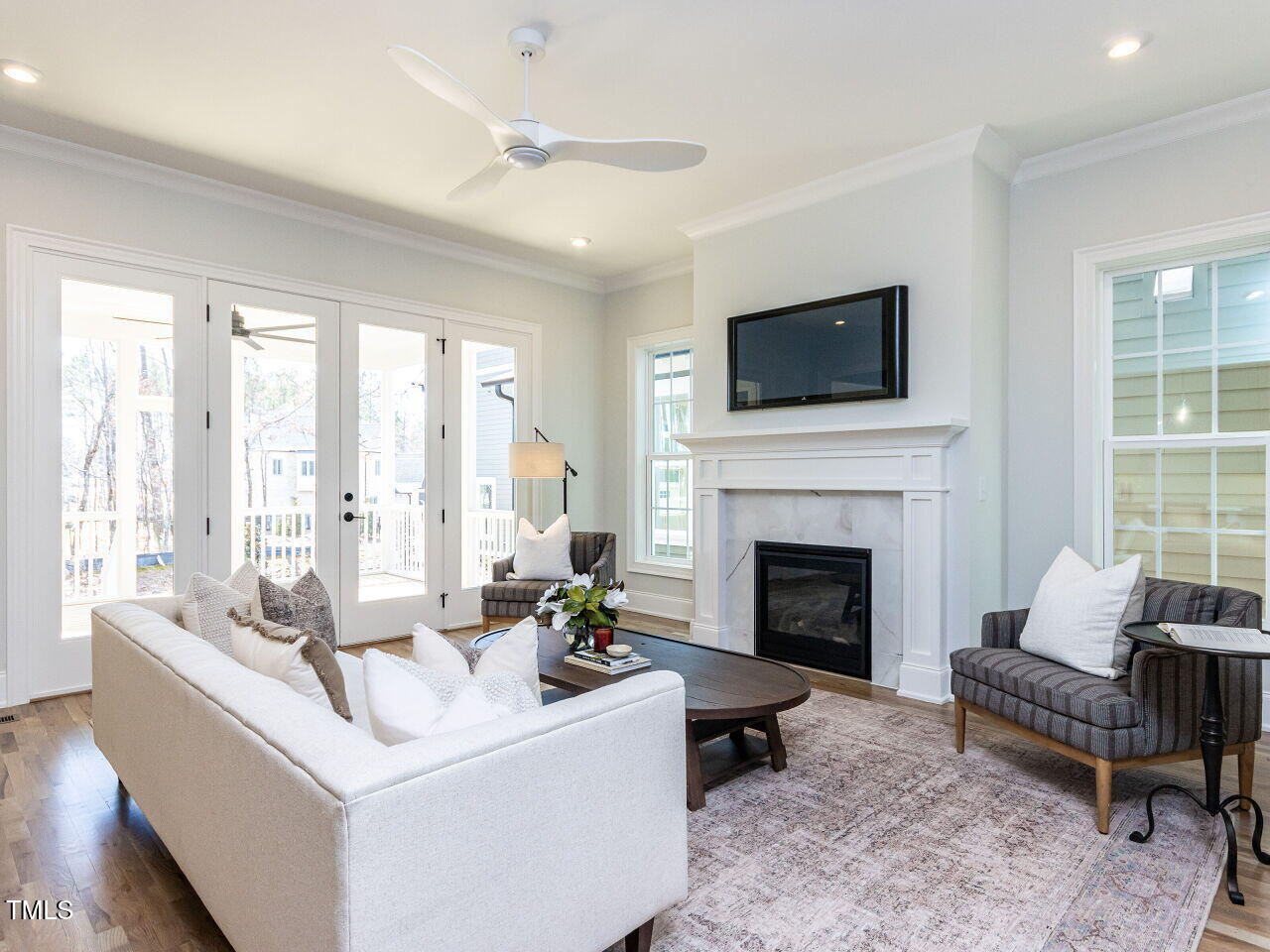 809 St Charles Street Durham, NC 27713 - Photo 10 of 43 a living room with furniture fireplace and large windows