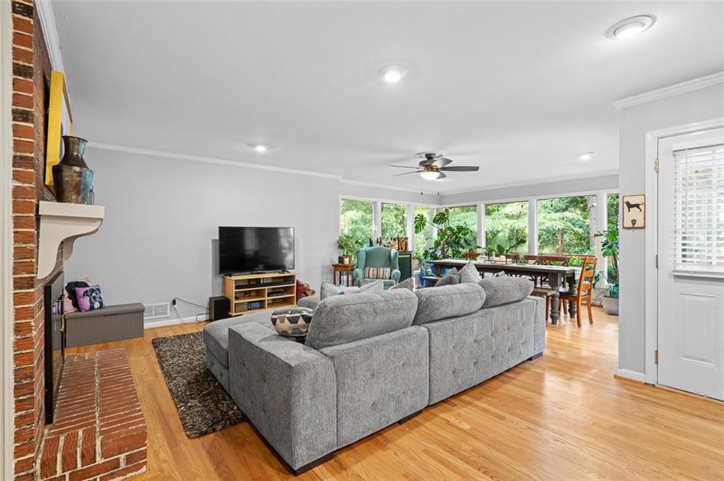 3698 Embry Circle Atlanta, GA 30341 - Photo 15 of 43 a living room with furniture and a flat screen tv