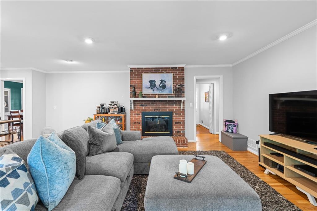 3698 Embry Circle Atlanta, GA 30341 - Photo 17 of 43 a living room with furniture and a flat screen tv