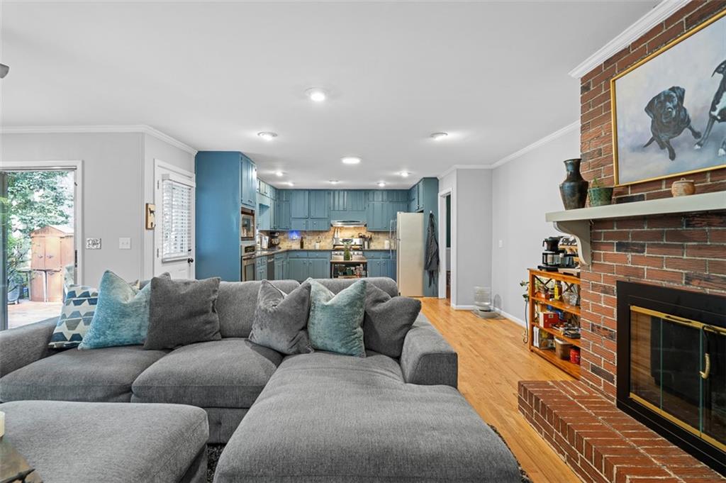 3698 Embry Circle Atlanta, GA 30341 - Photo 18 of 43 a living room with furniture and a fireplace