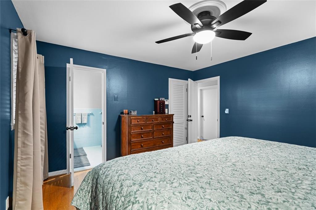 3698 Embry Circle Atlanta, GA 30341 - Photo 23 of 43 a bedroom with a bed and a closet