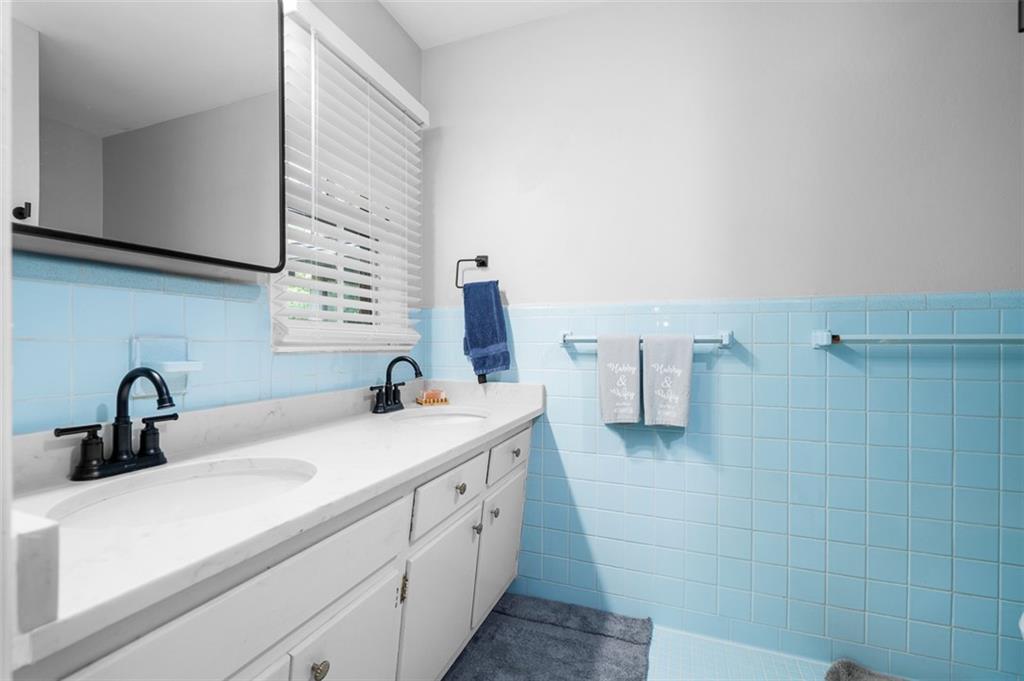 3698 Embry Circle Atlanta, GA 30341 - Photo 24 of 43 a bathroom with a sink and a mirror