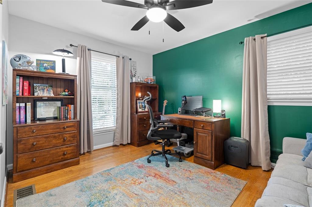 3698 Embry Circle Atlanta, GA 30341 - Photo 31 of 43 a living room with furniture and a flat screen tv