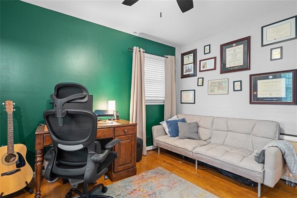 3698 Embry Circle Atlanta, GA 30341 - Photo 32 of 43 a living room with furniture and a potted plant