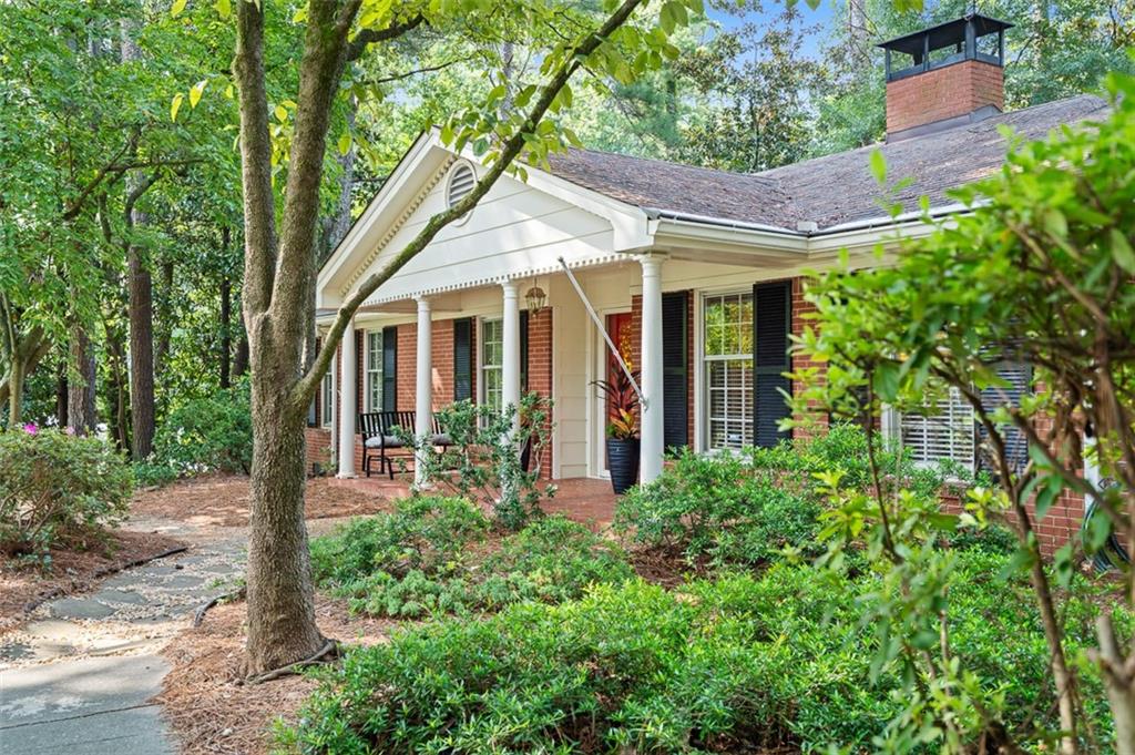 3698 Embry Circle Atlanta, GA 30341 - Photo 4 of 43 a view of a house with porch and garden