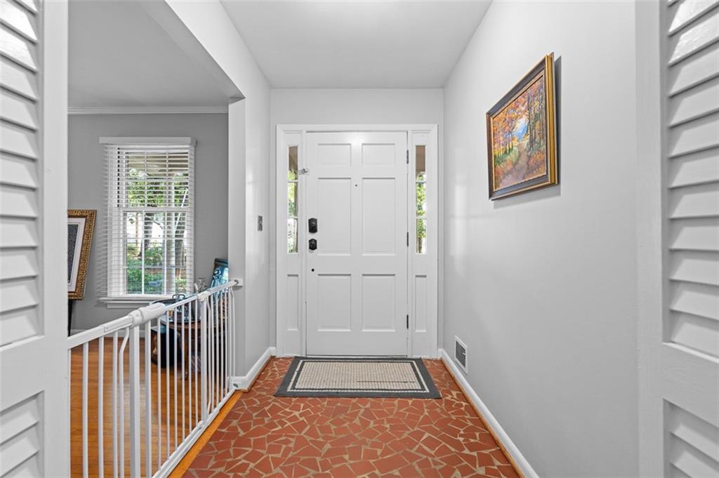 3698 Embry Circle Atlanta, GA 30341 - Photo 6 of 43 a view of hallway with a door and wooden floor