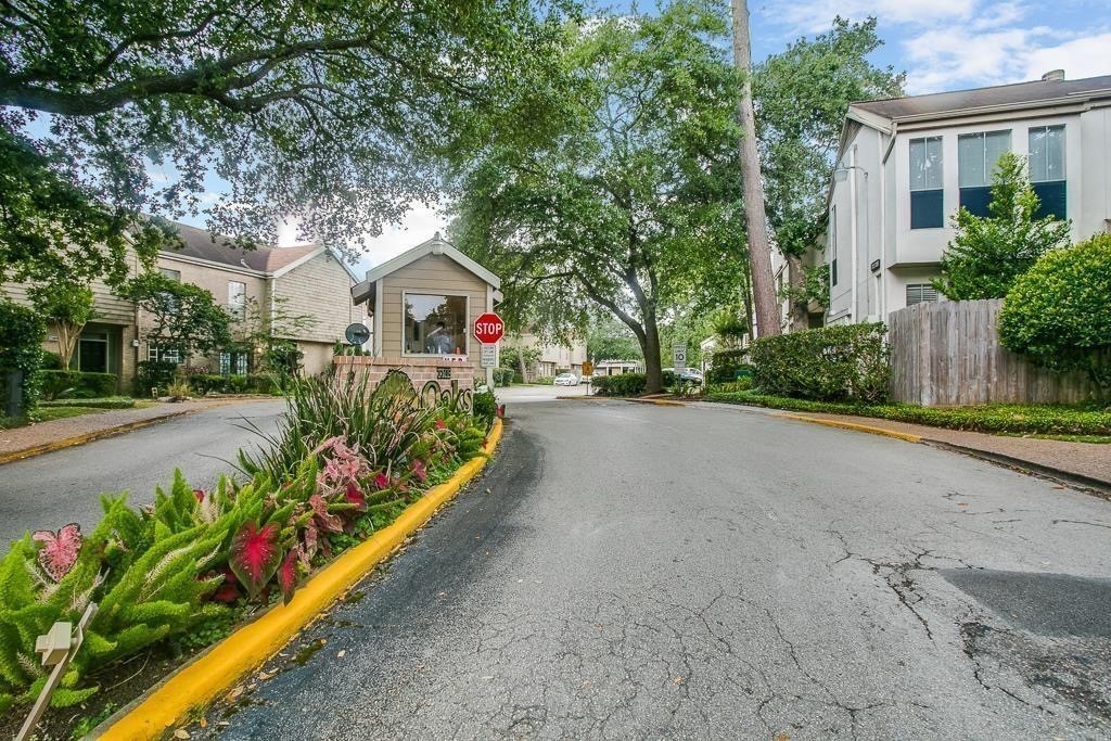 2100 Tanglewilde Street, Unit 537 Houston, TX 77063 - Photo 3 of 13 a view of a garden with flower plants