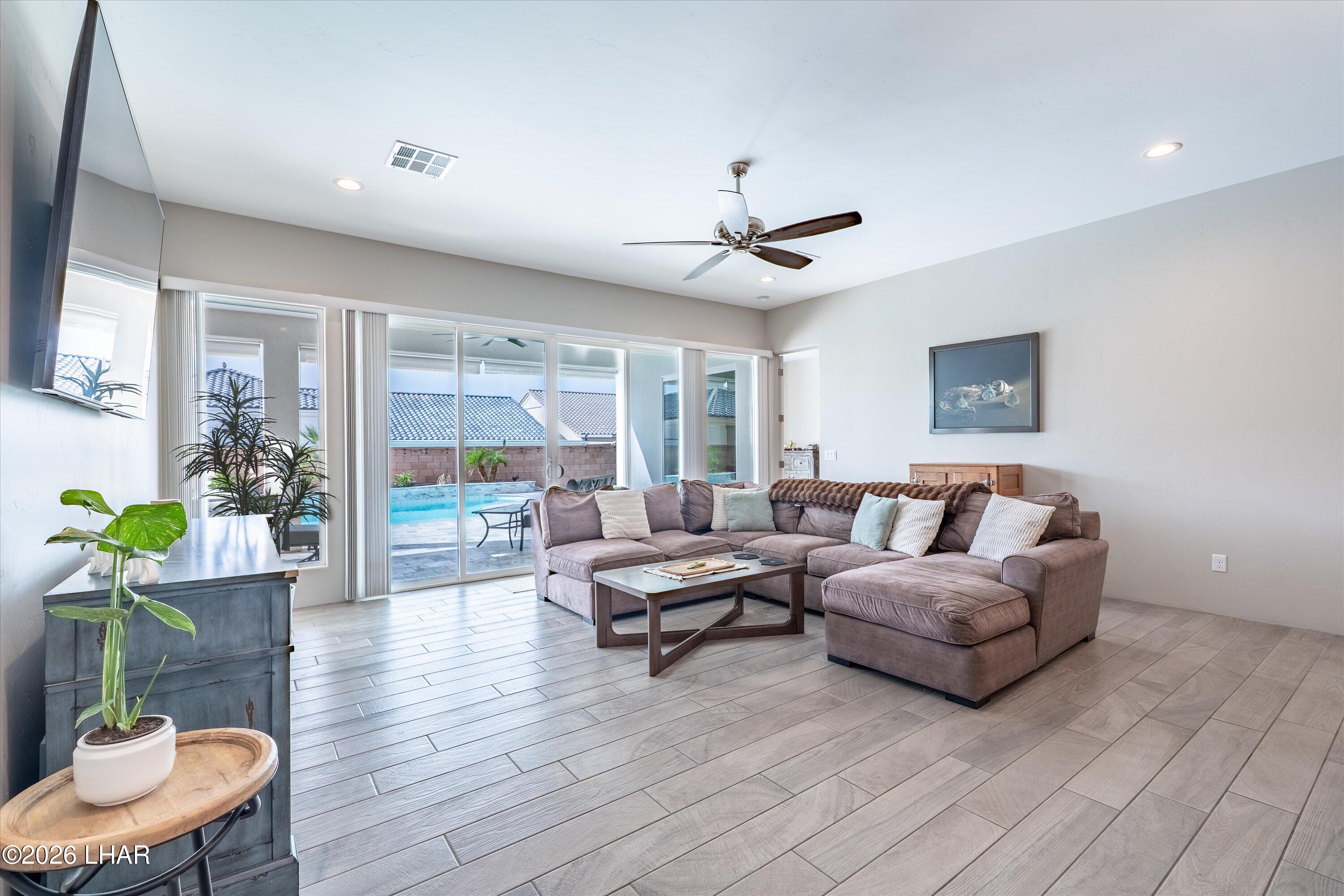4667 North Juneberry Road Lake Havasu City, AZ 86404 - Photo 11 of 50 a living room with furniture and a large window