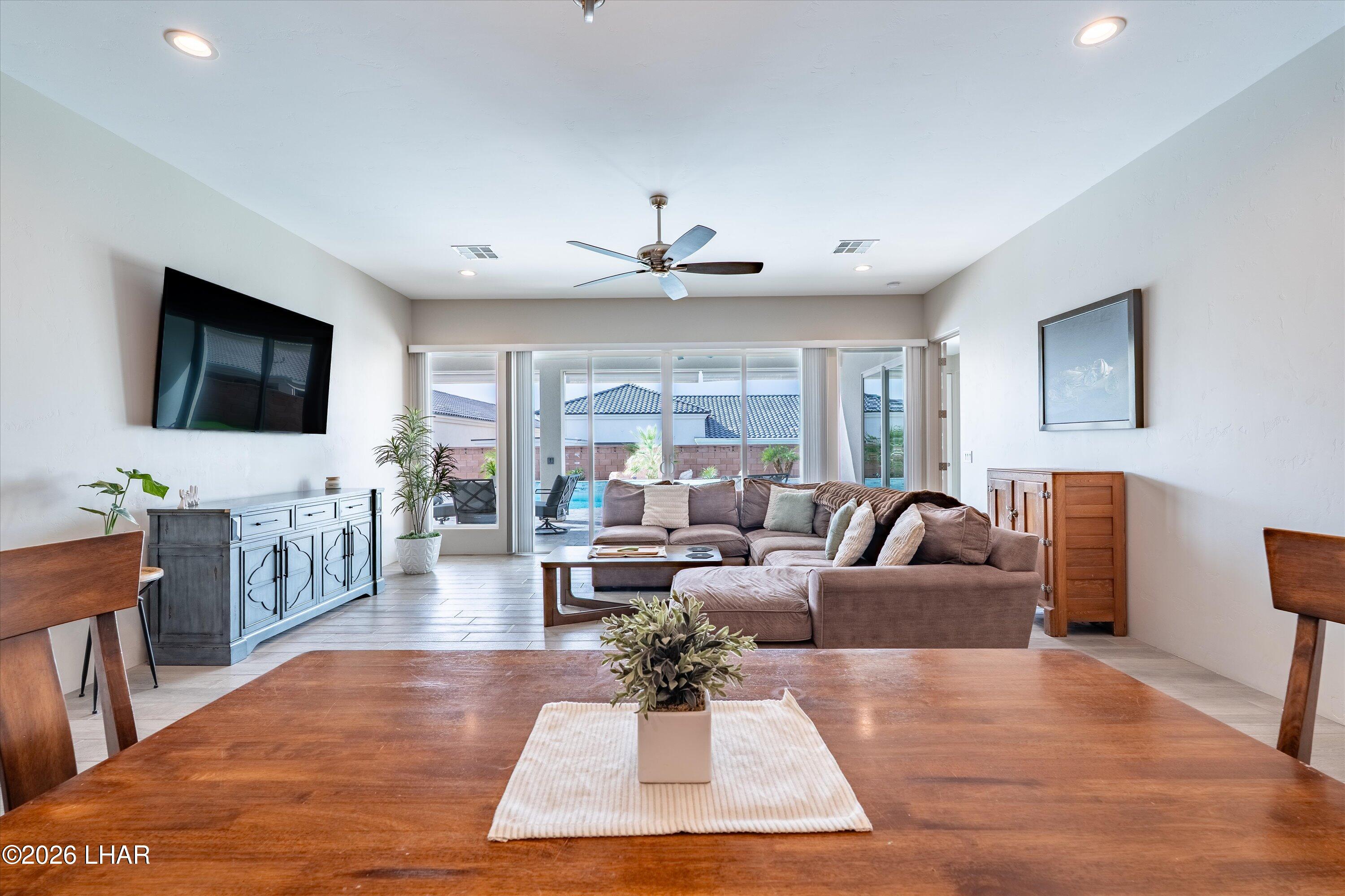 4667 North Juneberry Road Lake Havasu City, AZ 86404 - Photo 13 of 50 a living room with furniture and a flat screen tv