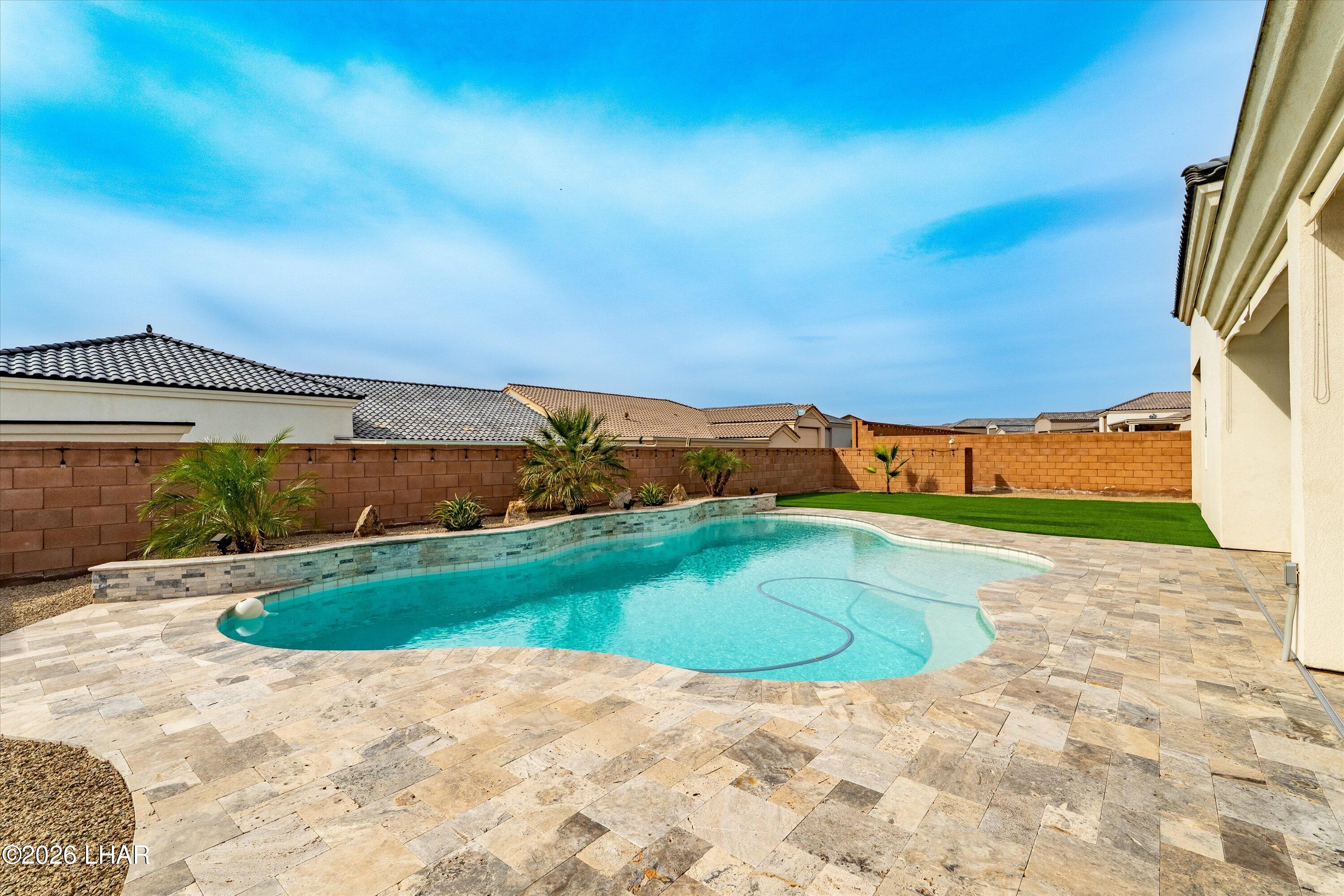 4667 North Juneberry Road Lake Havasu City, AZ 86404 - Photo 25 of 50 a view of outdoor space swimming pool and outdoor seating