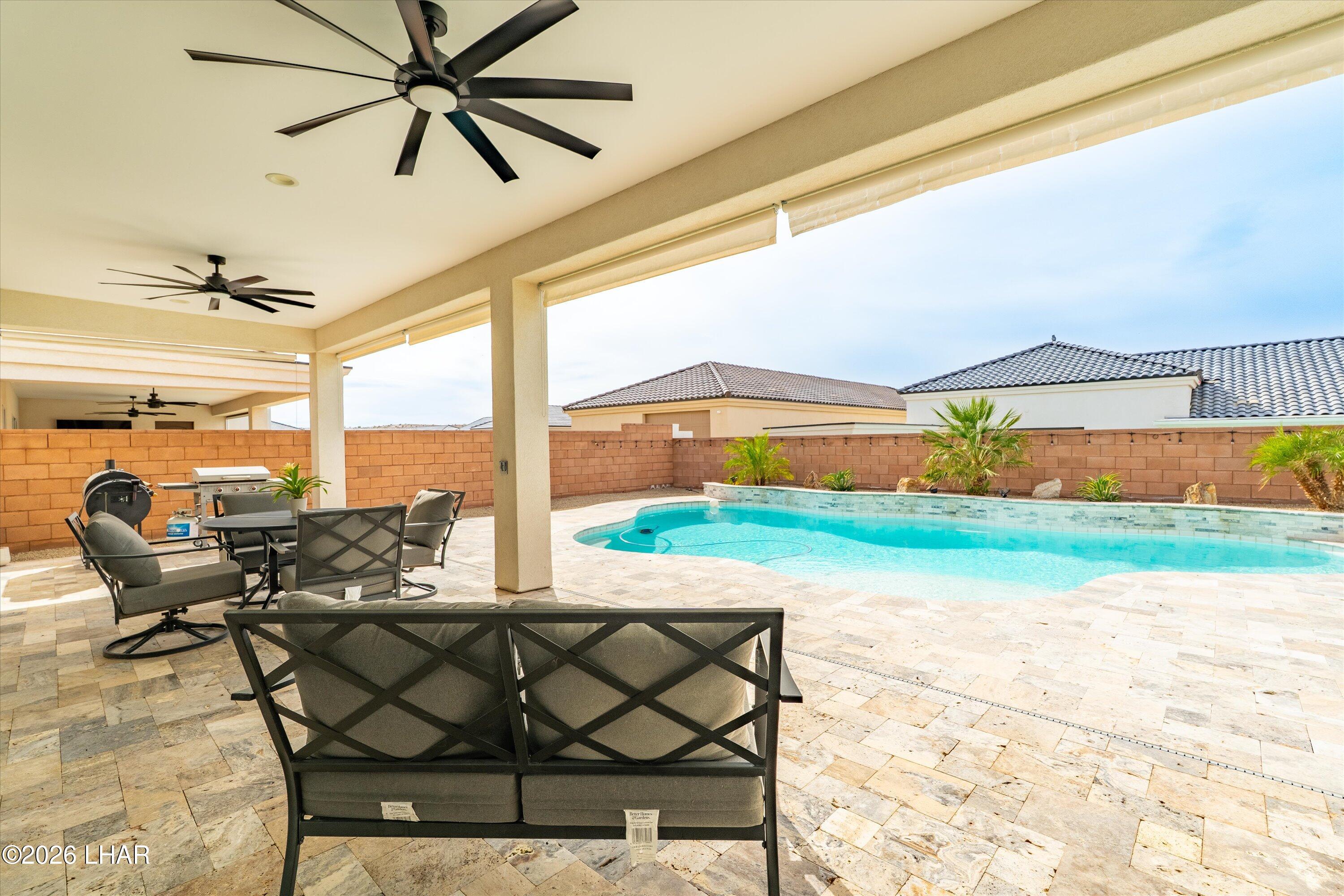4667 North Juneberry Road Lake Havasu City, AZ 86404 - Photo 27 of 50 a outdoor space with patio lots of furniture