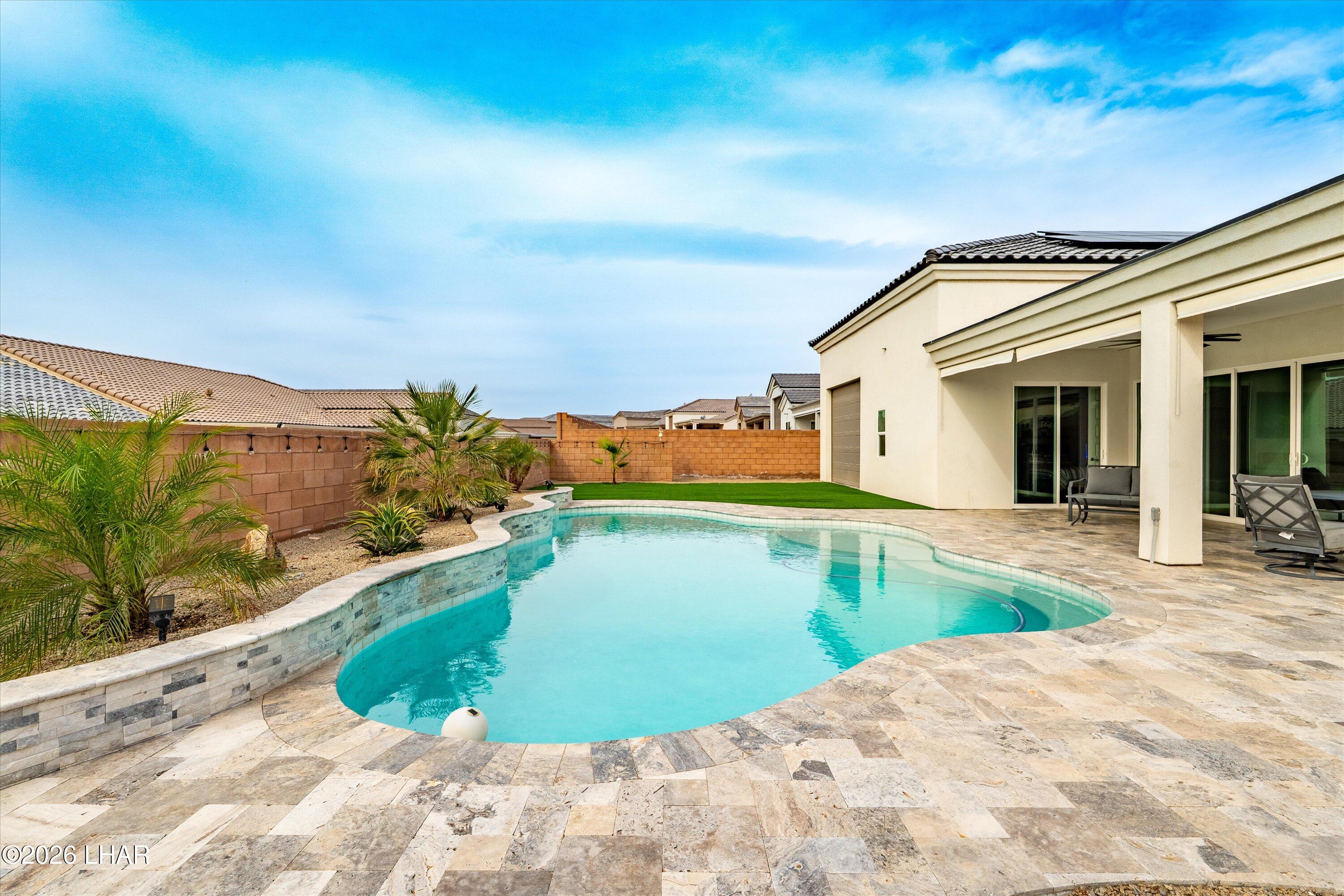 4667 North Juneberry Road Lake Havasu City, AZ 86404 - Photo 28 of 50 a view of a swimming pool with lounge chair